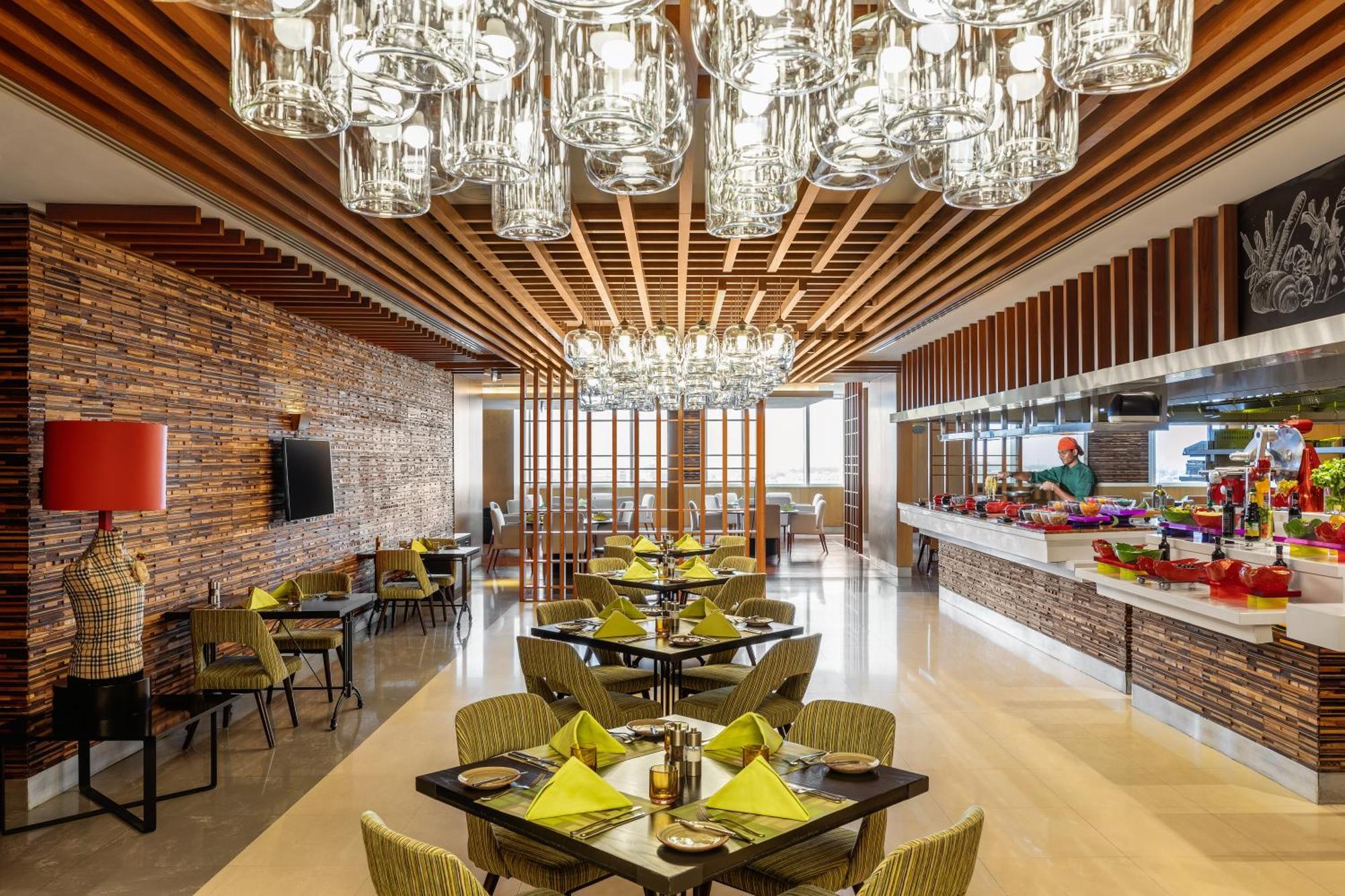 V Hotel Dubai, Curio Collection By Hilton Ngoại thất bức ảnh The restaurant
