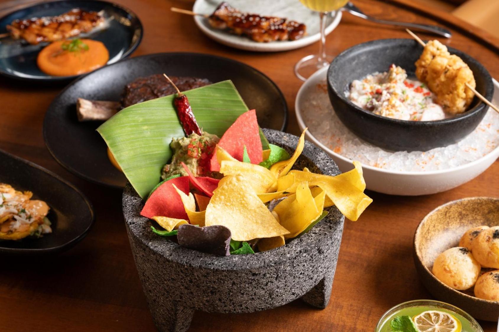 V Hotel Dubai, Curio Collection By Hilton Ngoại thất bức ảnh A selection of dishes at the restaurant